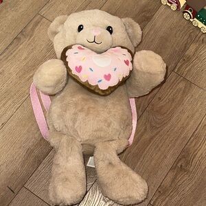 Plush Teddy Bear with Pink Heart Accessory